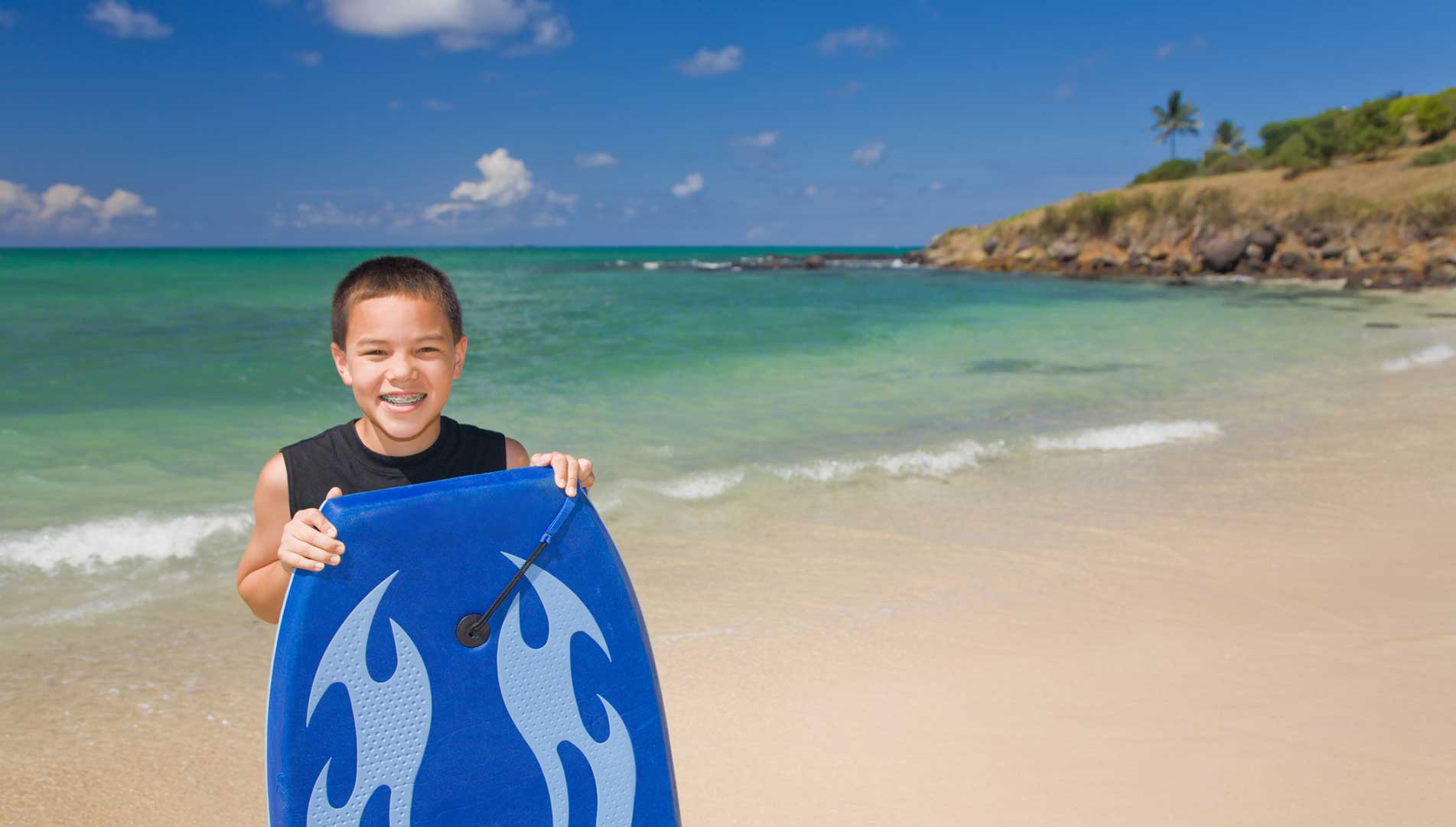 Boy with Surfboard